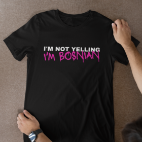mockup-of-a-man-putting-a-bella-canvas-t-shirt-over-a-surface-m52027